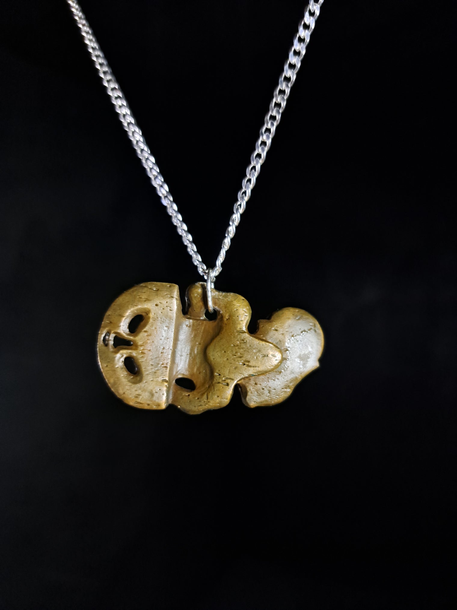 Bronze Hei Tiki (Hole-Type)